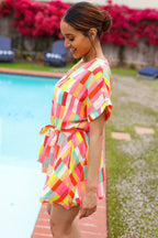 Eyes On You Coral Geo Abstract Surplice Woven Romper
