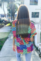 Dazzle in Multicolor Animal Patchwork V Neck Dolman Cap Sleeve Top