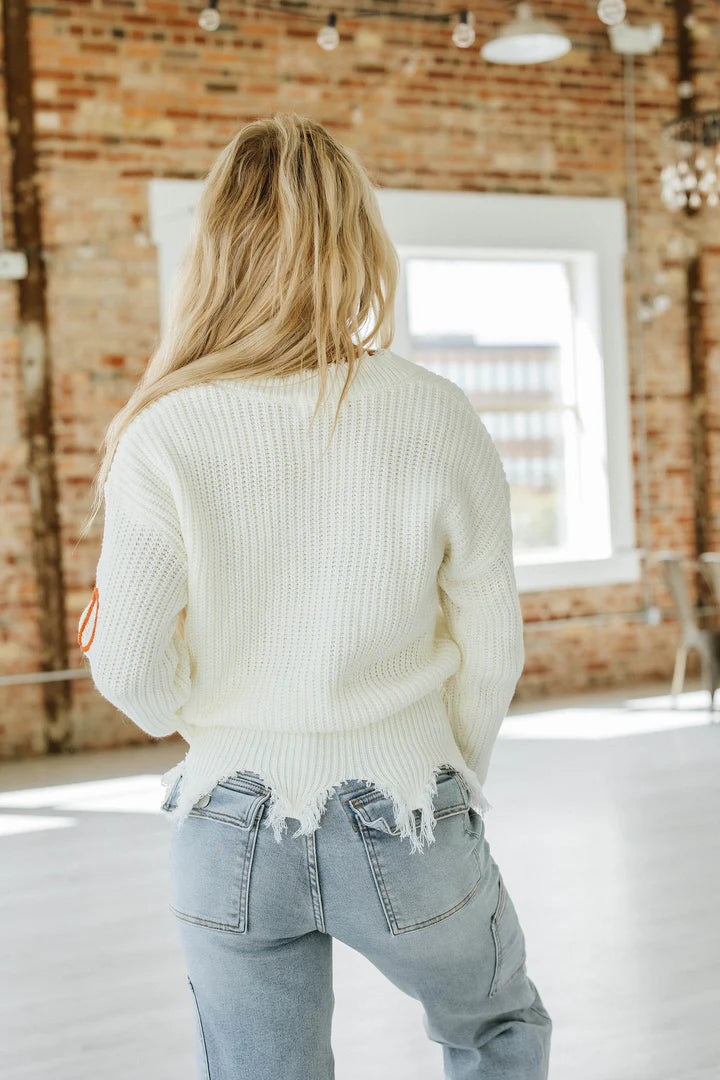Pumpkin V-Neck Distressed Sweater